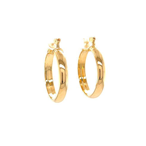 The 1 Inch Round Hoop Earrings, designed with a flat inner side and crafted from 14k gold-filled material, are free of lead and nickel. They feature small flower details at the top, set against a white background.